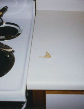 Before Formica Stain Repair — N. Charleston, SC — Surface Specialists