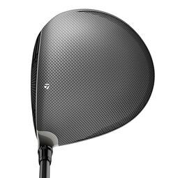 TaylorMade Qi10 Max golf driver, dark gray with carbon fiber design, club head angled up, facing forward.