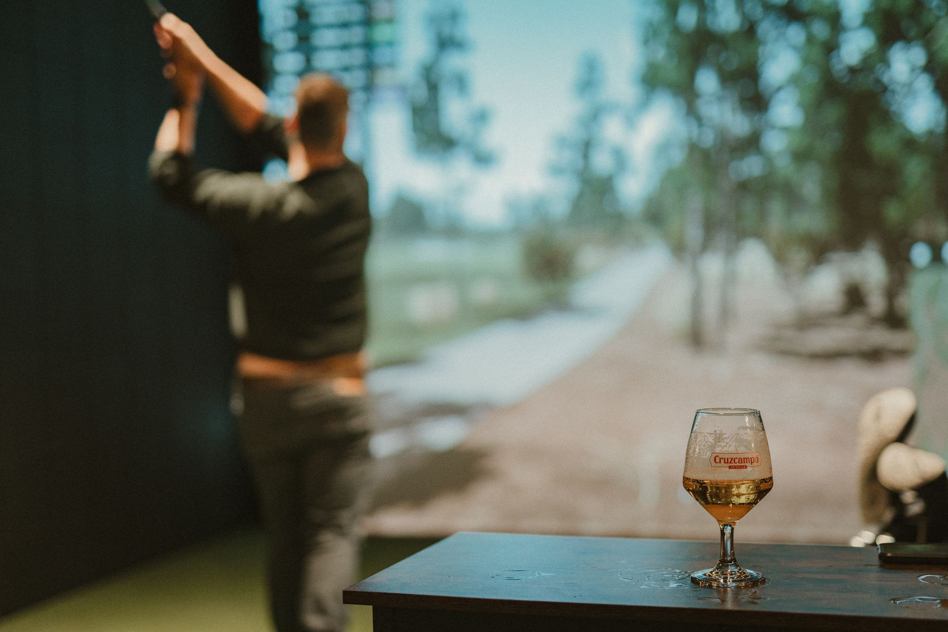 Man playing golf in the simulator