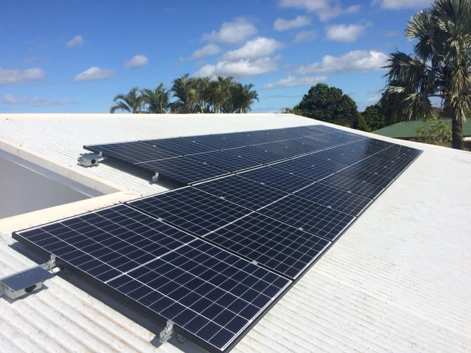 A Roof With a Lot of Solar Panels on it — Ocean Air Electrical in Skennars Head, NSW