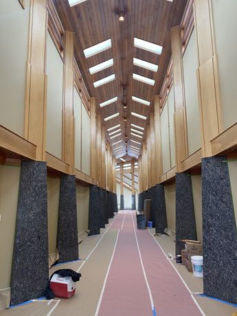 A long hallway with a track in the middle