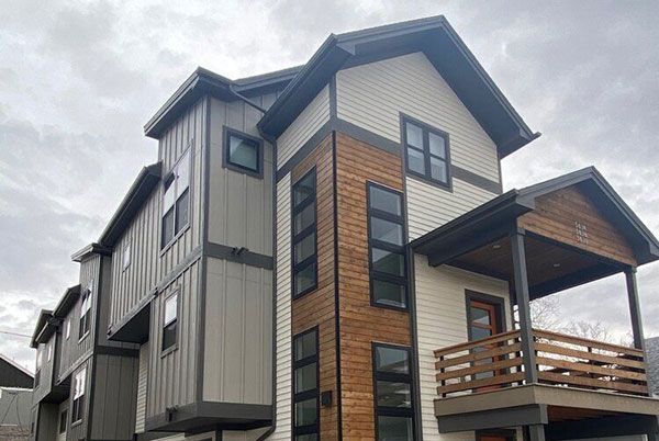 A large house with a balcony and a lot of windows.