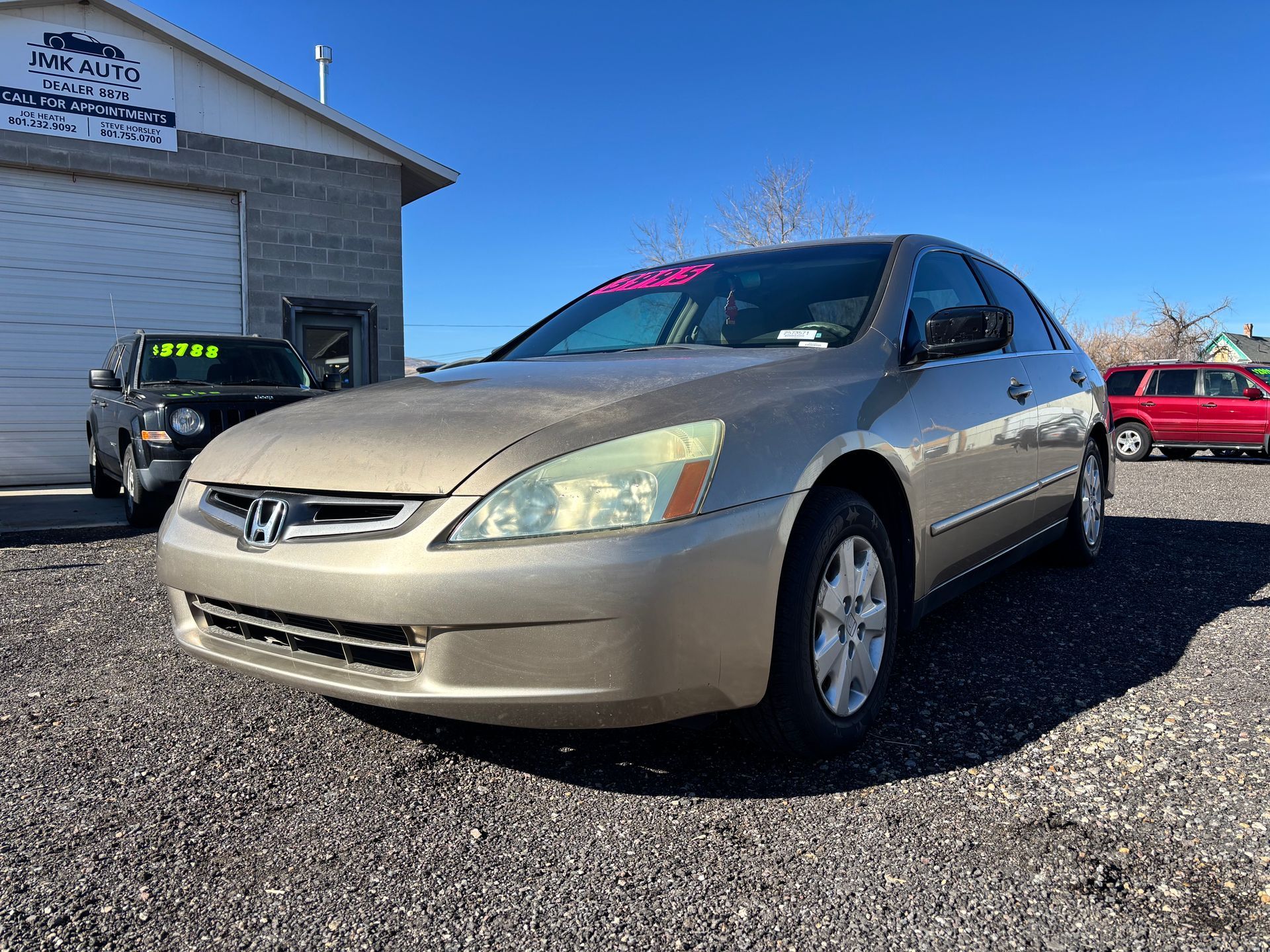 2004 Honda Accord, reliable, great on gas. 