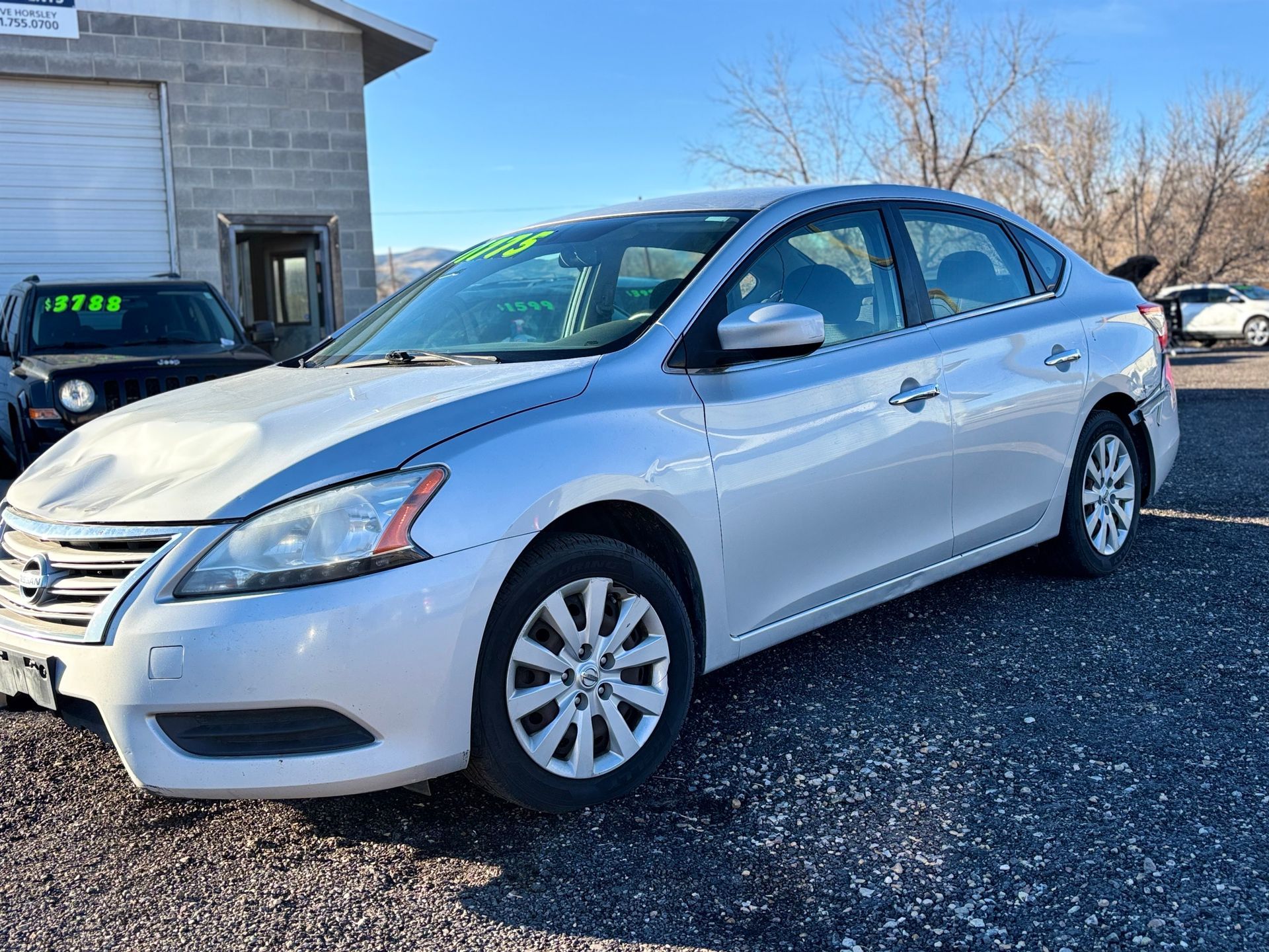 2013 Nissan Sentra, reliable, great on gas.