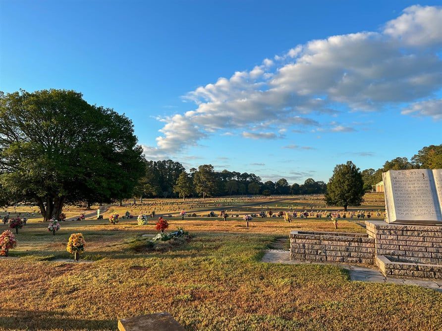 A cemetery with a book in the middle of it.