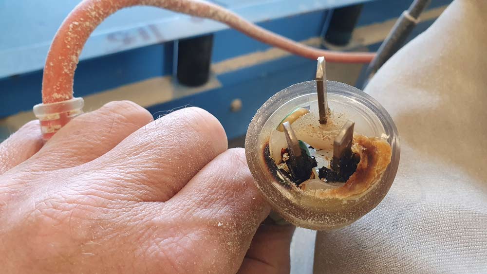 Power Plug With Burn Marks — Coastal Test & Tag in Bonville, NSW
