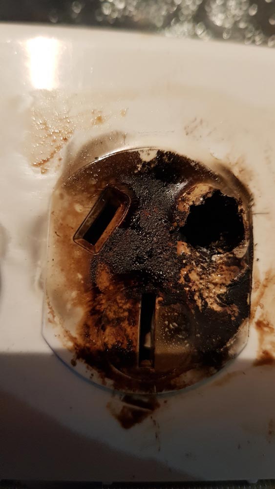 Wall Socket With Burn Marks — Coastal Test & Tag in Bonville, NSW