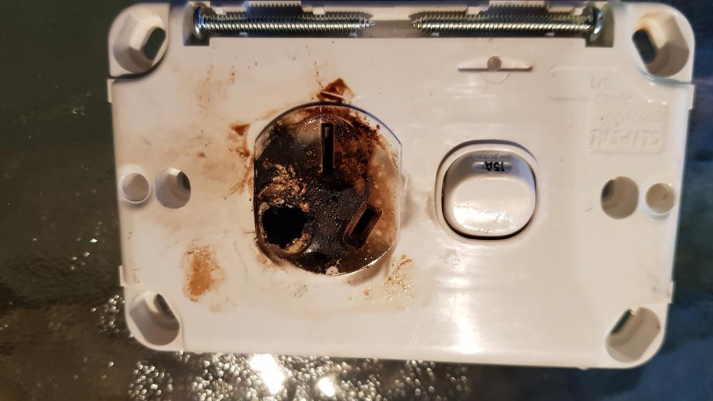 Burned Electrical Outlet — Coastal Test & Tag in Bonville, NSW