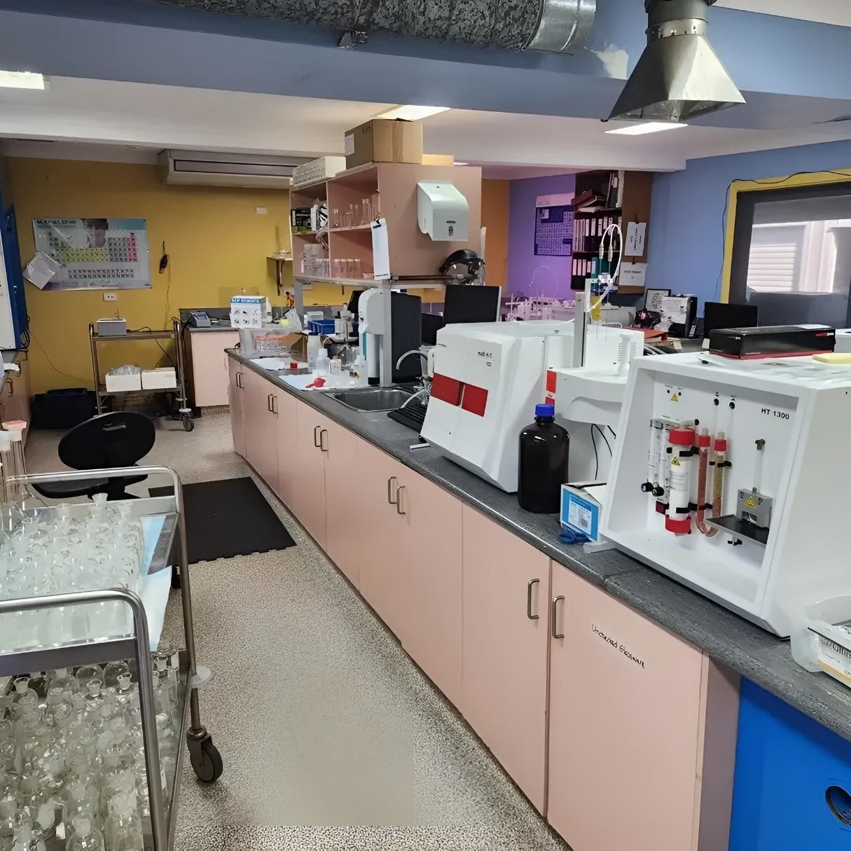 A Laboratory With Pink Cabinets and White Appliances — Coastal Test & Tag in Grafton, NSW