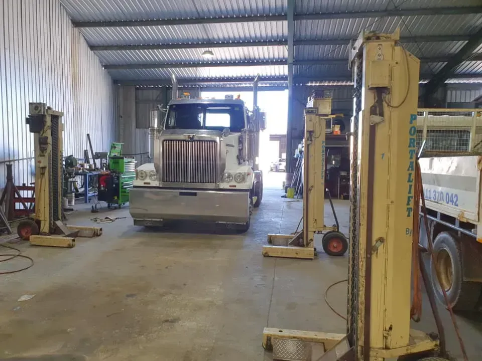 A White Semi-truck Parked Inside a Workshop — Mid North Coast Heavy Vehicle Repairs In Laurieton, NSW