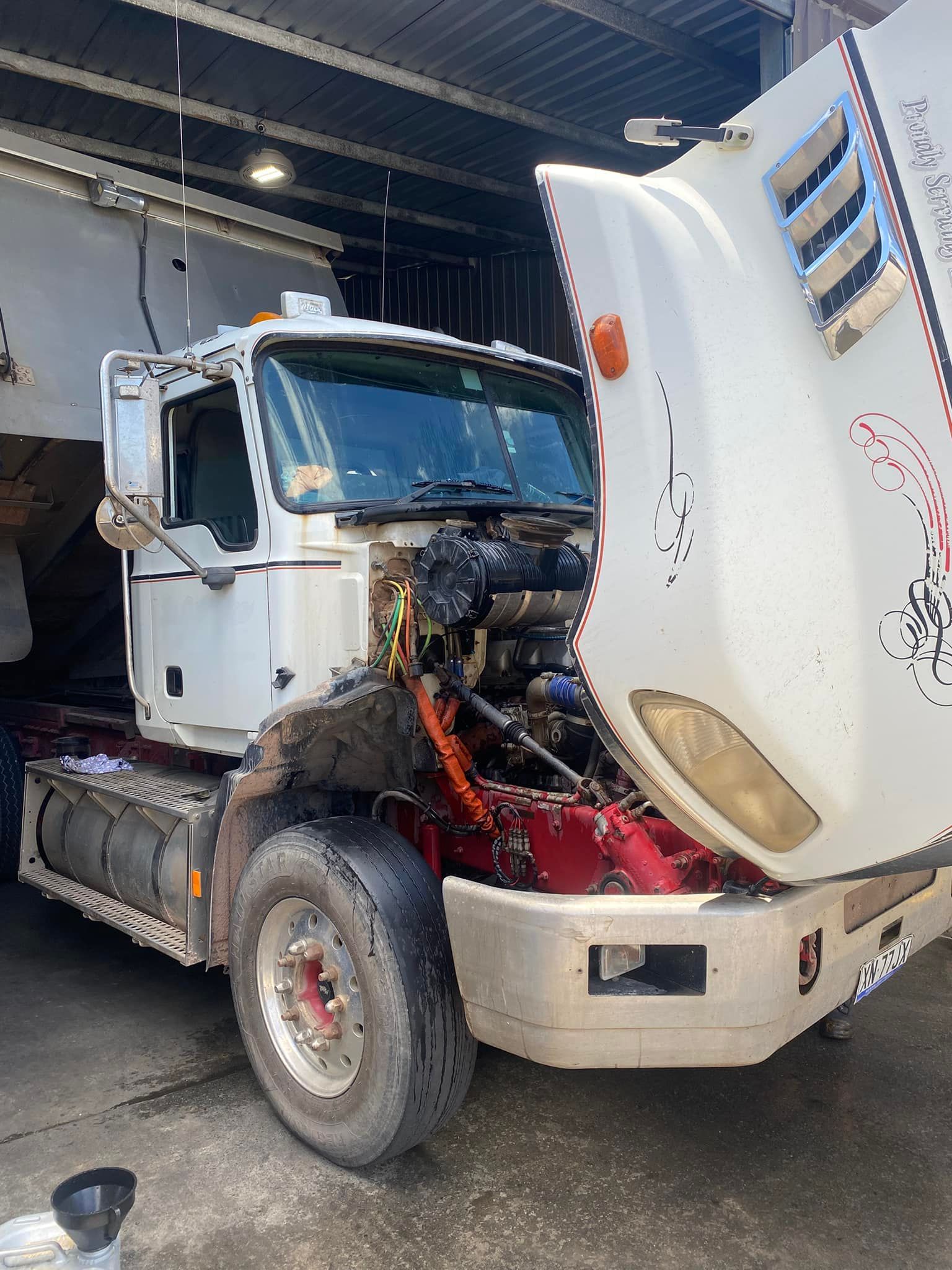 A White Semi-truck Parked in a Garage — Mid North Coast Heavy Vehicle Repairs In Wauchope, NSW