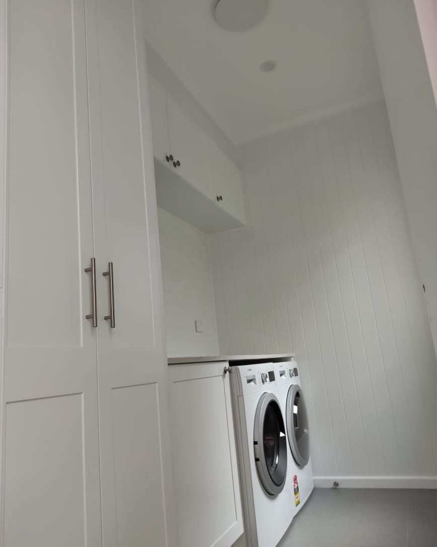 White Laundry Room With Washing Machine and Cabinet Storage — Canelo Cabinetry In Rocklea, QLD