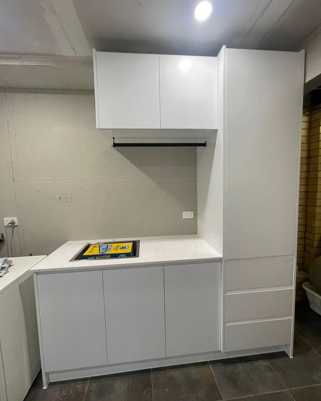 White Minimalist Laundry Room With Overhead Cabinets — Canelo Cabinetry In Rocklea, QLD