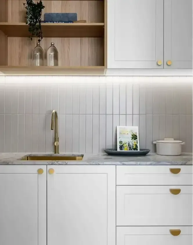 White and Wood Toned Kitchen With Gold Faucet, White Cabinets and a Light Grey Backsplash — Canelo Cabinetry In Rocklea, QLD
