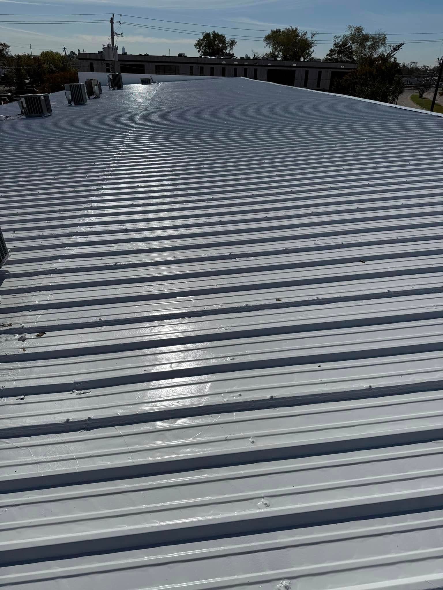 The roof of a building has been painted white and looks like a swimming pool.