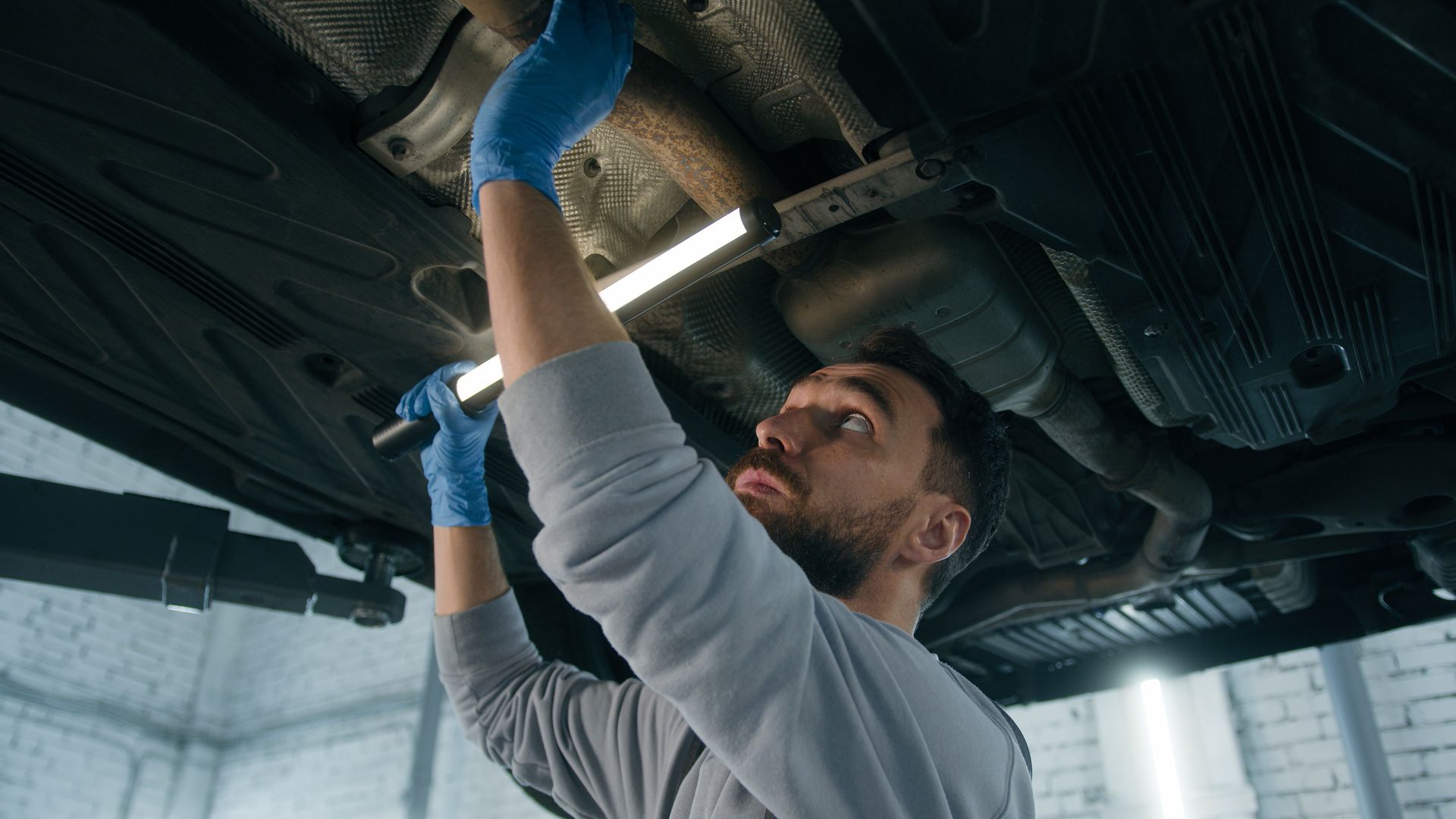 Expert technician conducting diagnostic checks on a vehicle.