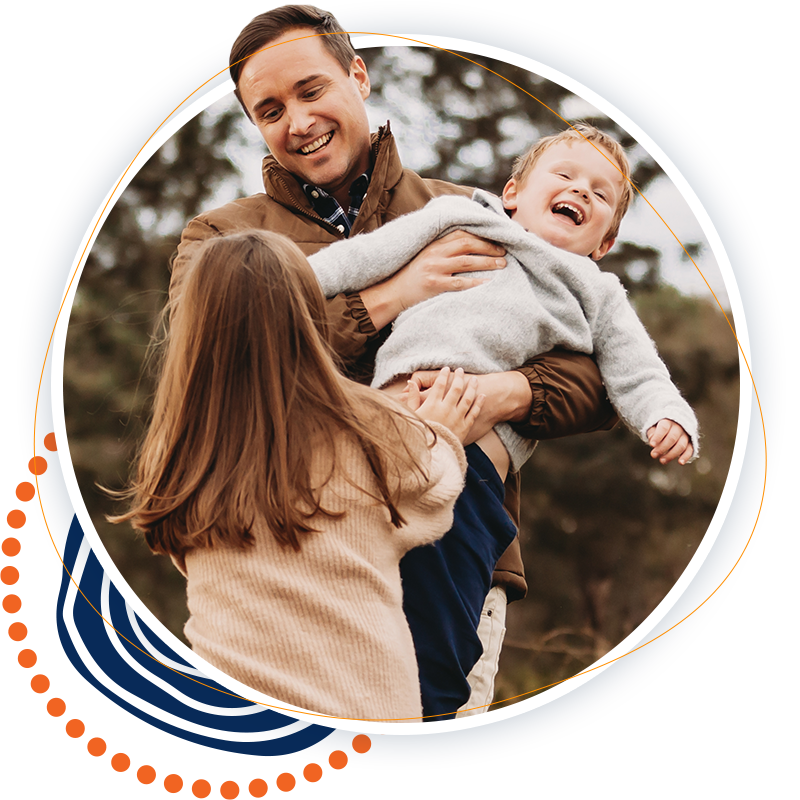 a couple playing with their child