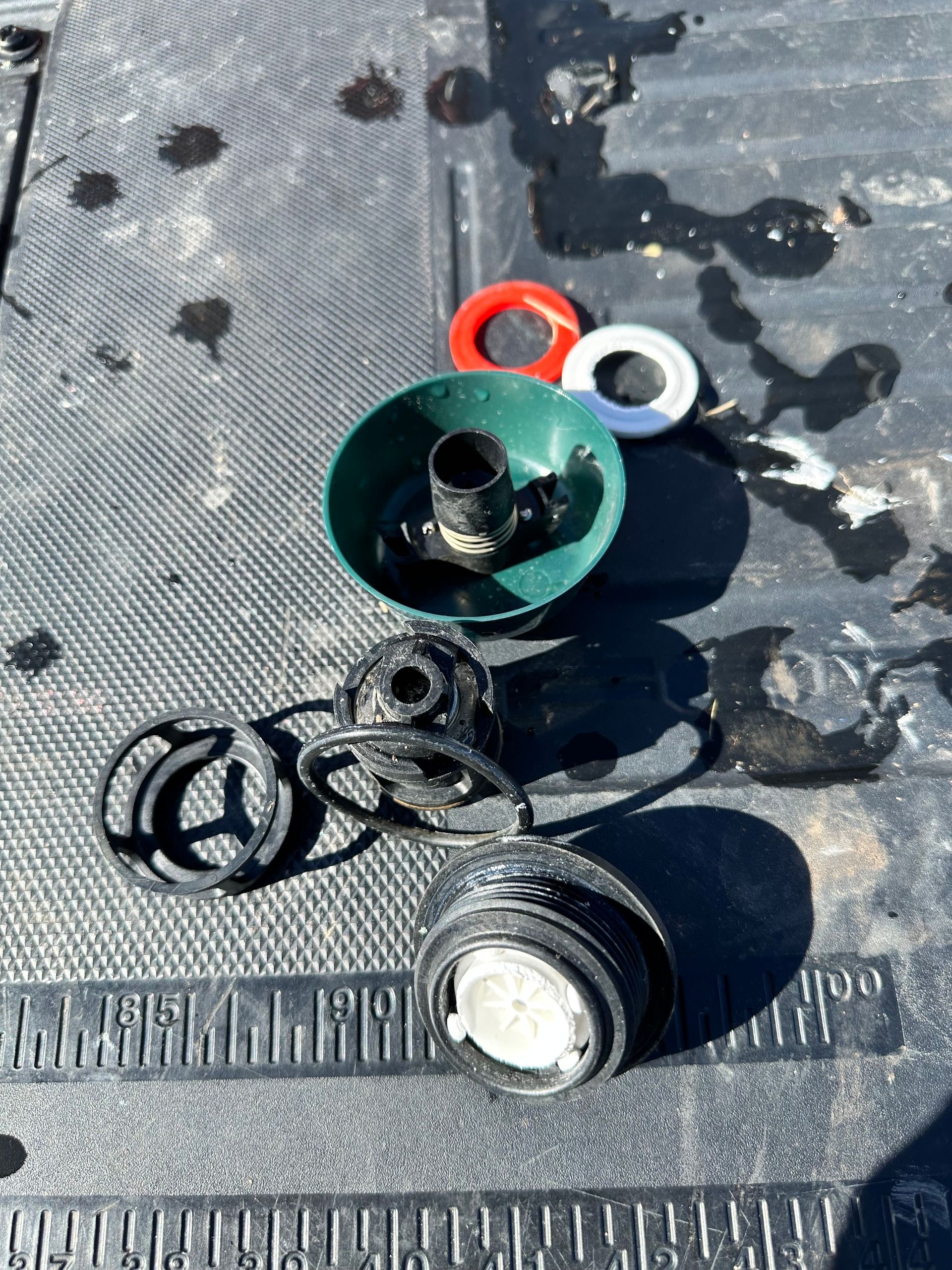 A bunch of objects are sitting on top of a black surface.