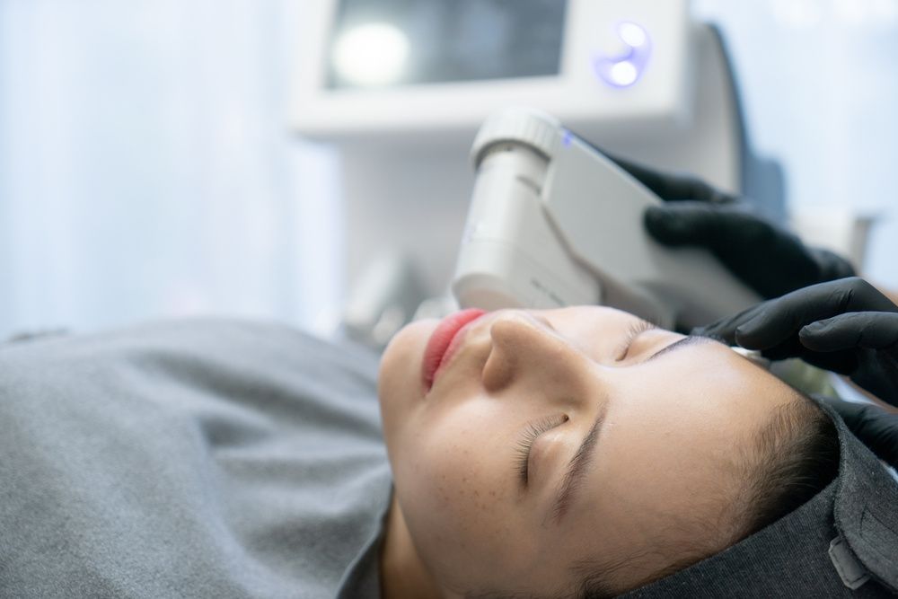 A Woman is Getting a Skin Treatment — Coastal Skin & Laser in Caloundra, QLD