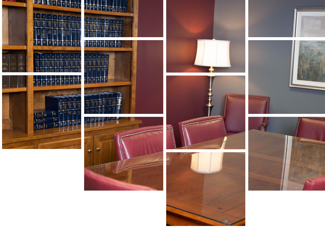 Wooden Table with Law Books — Lima, OH — Mackey Law, LLC