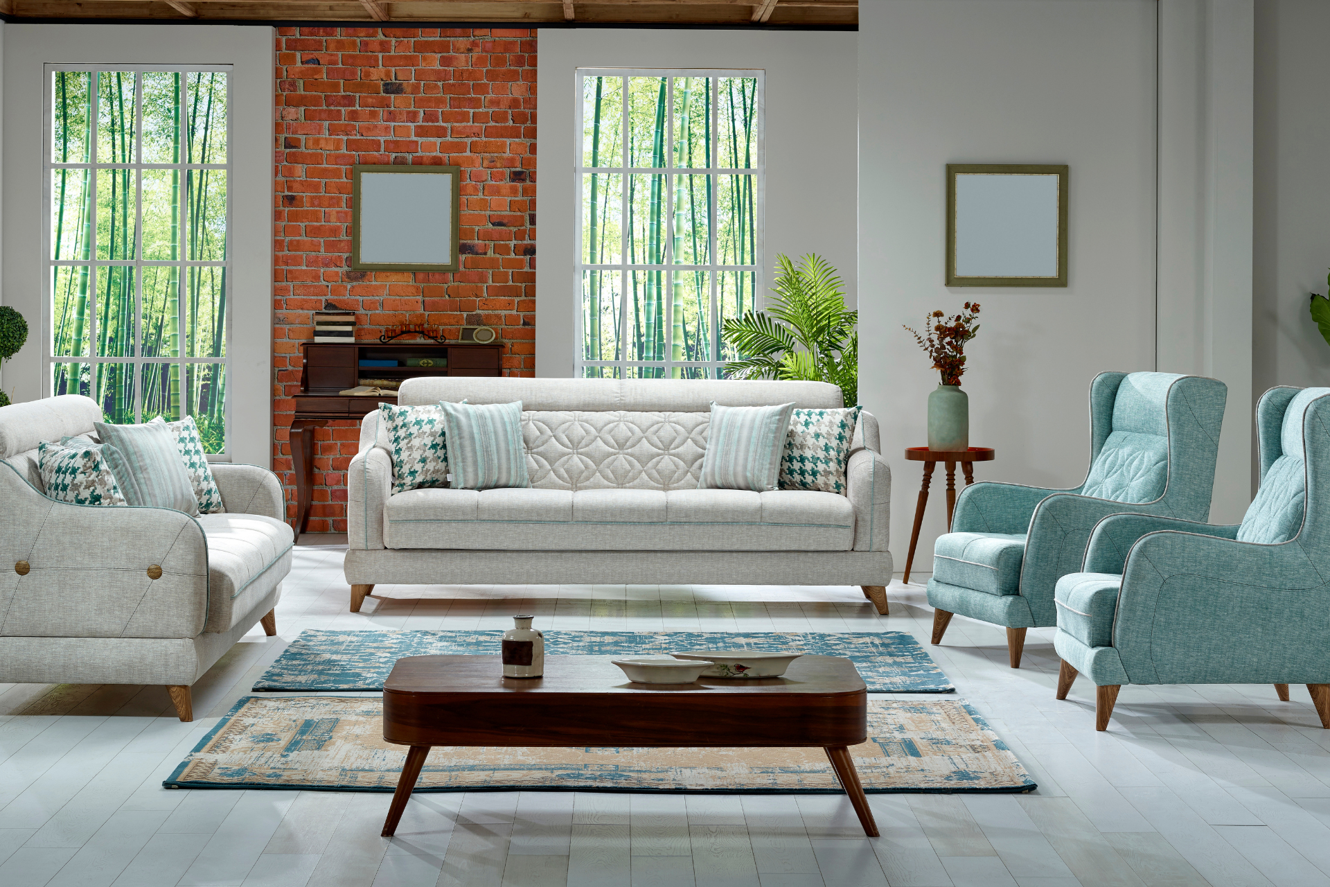 A living room with a couch , chairs , and a coffee table.