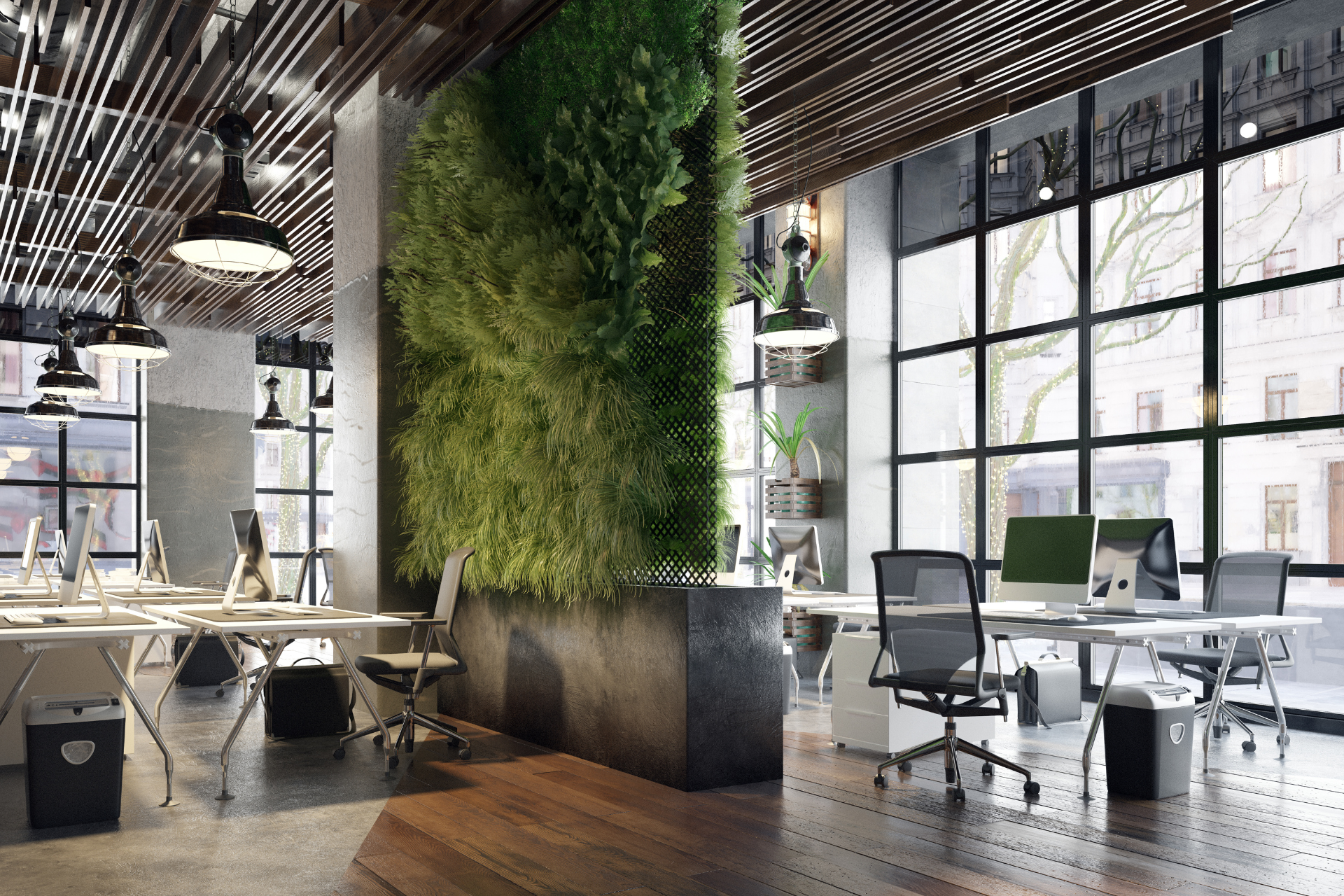 A modern office with lots of windows and a green wall.