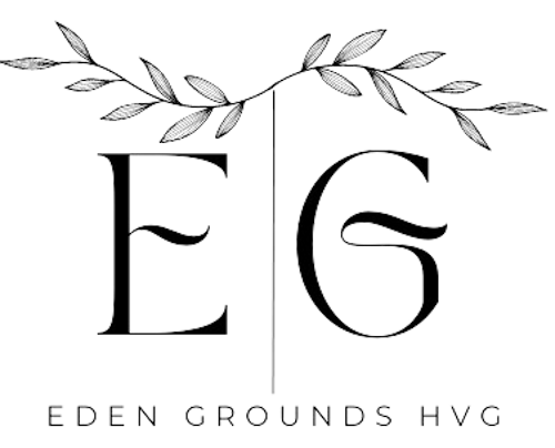 A black and white logo for eden grounds hvg with a branch and leaves.