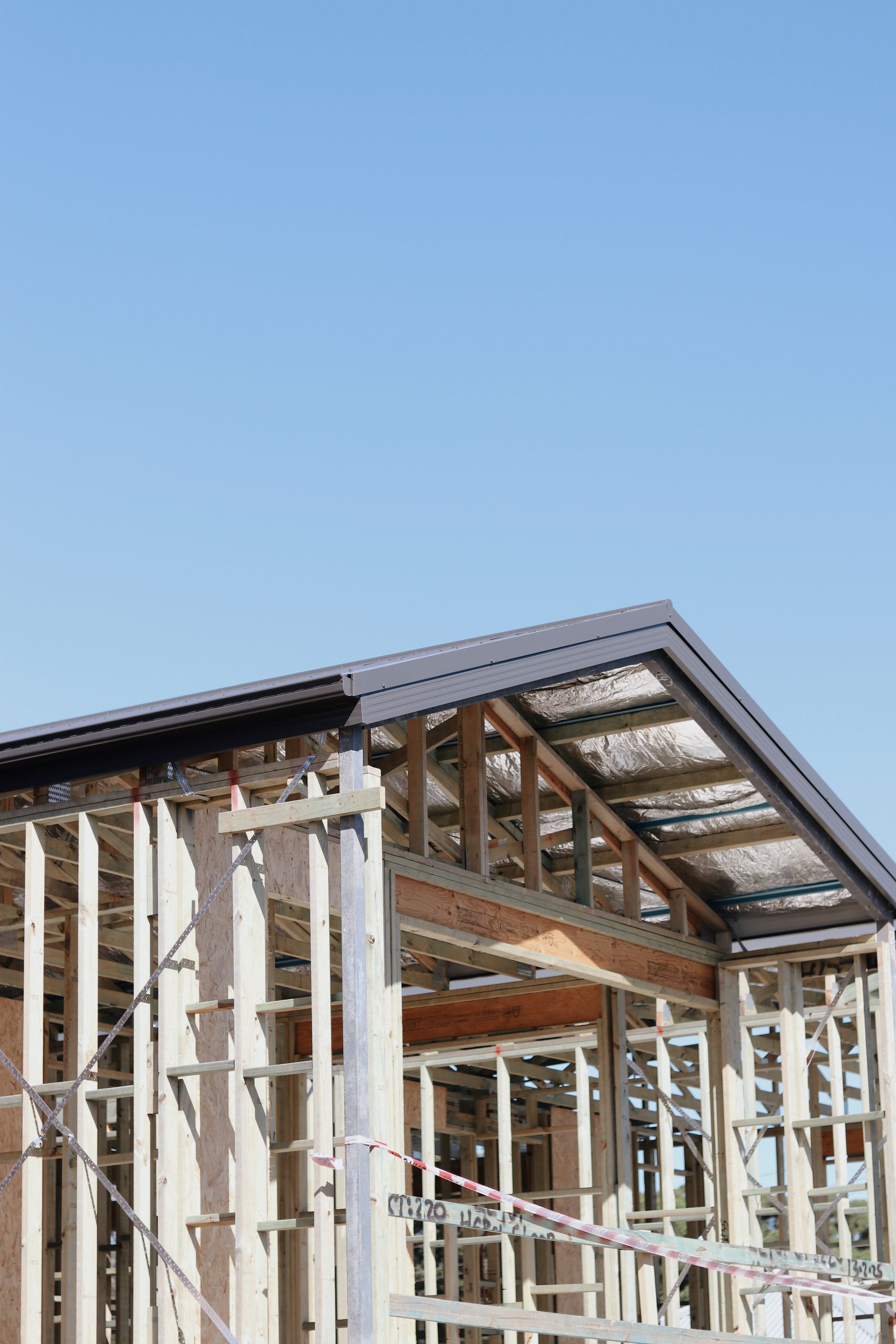 Wooden Frame of a House Under Construction — Ryan's Bricklaying In Eleebana, NSW