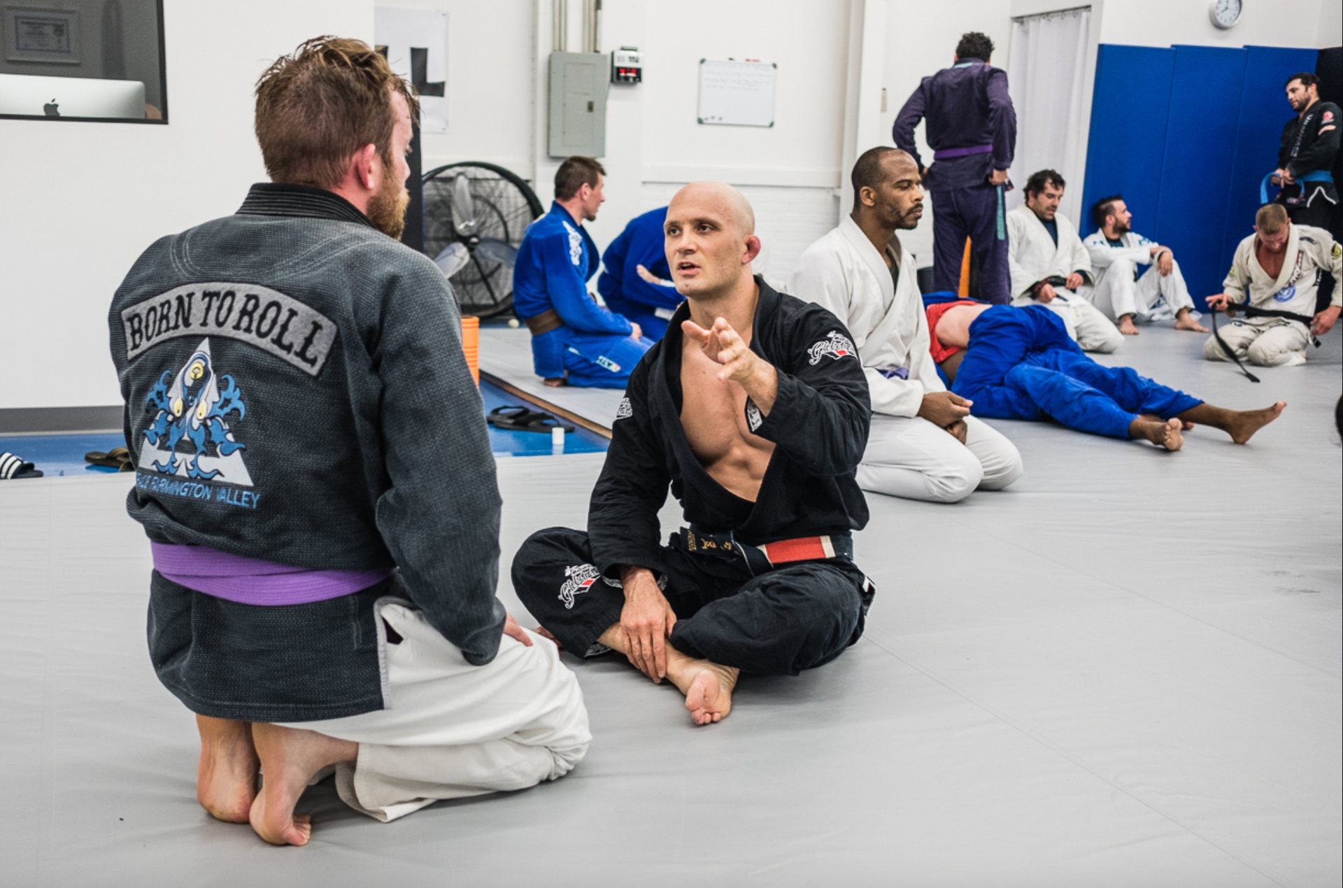 Adults drilling Brazilian Jiu-Jitsu at Soulcraft Martial Arts in Hamden, CT, building calm decision-making skills.
