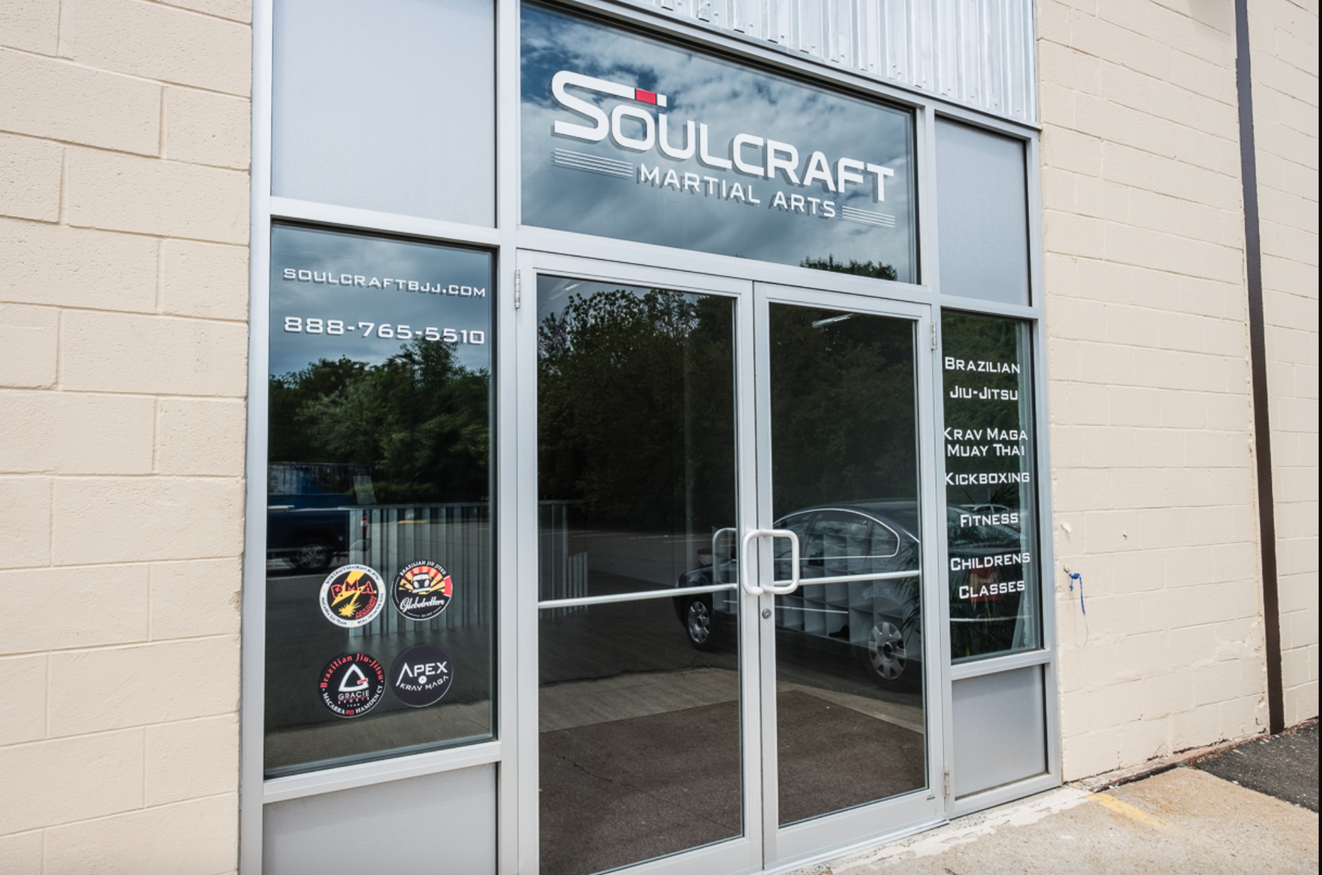 Adults drilling Brazilian Jiu Jitsu technique at Soulcraft Martial Arts in Hamden, CT for fitness and confidence