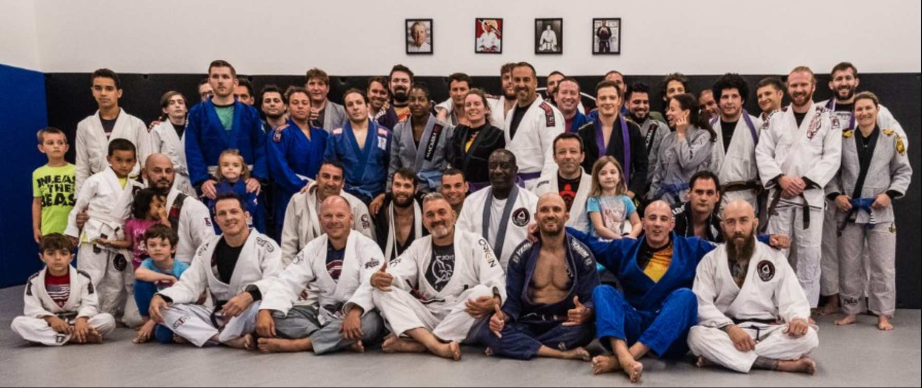 Adults drilling and rolling in Brazilian Jiu Jitsu class at Soulcraft Martial Arts in Hamden, CT, building friendships.