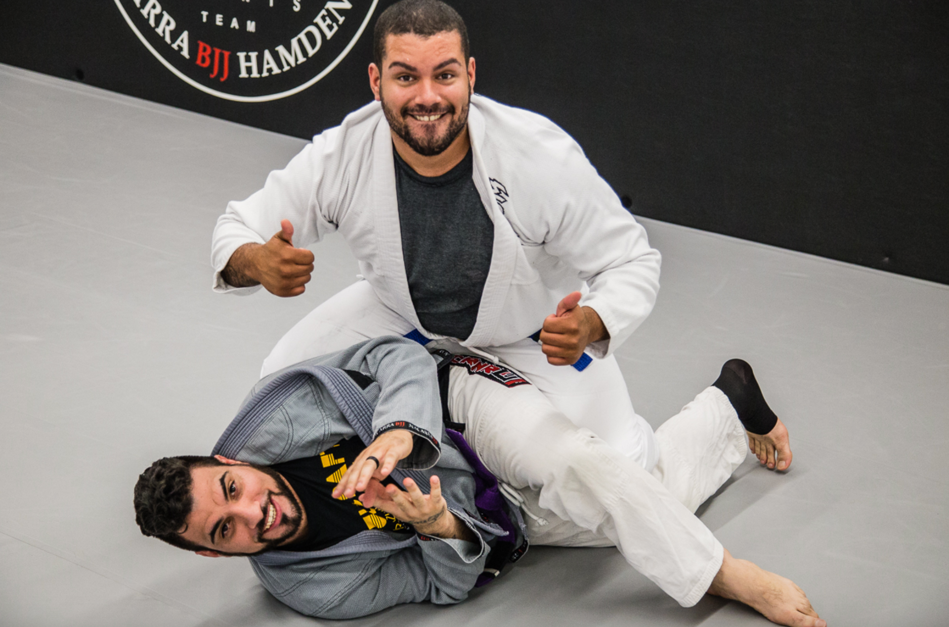 Adult students practicing Brazilian Jiu-Jitsu drills at Soulcraft Martial Arts in Hamden, CT for confidence and focus (118 characters) Geo Tag: Location Name: Whitneyville, Hamden Latitude: 41.3959