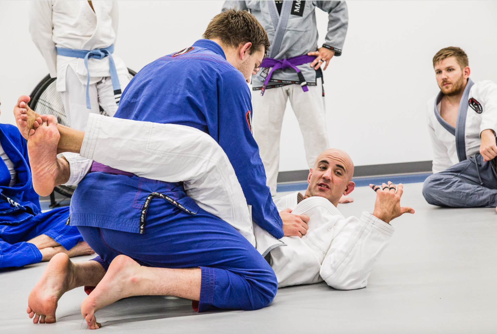Adults practicing Jiu-Jitsu drills at Soulcraft Martial Arts in Hamden, CT, building focus, energy, and strength.