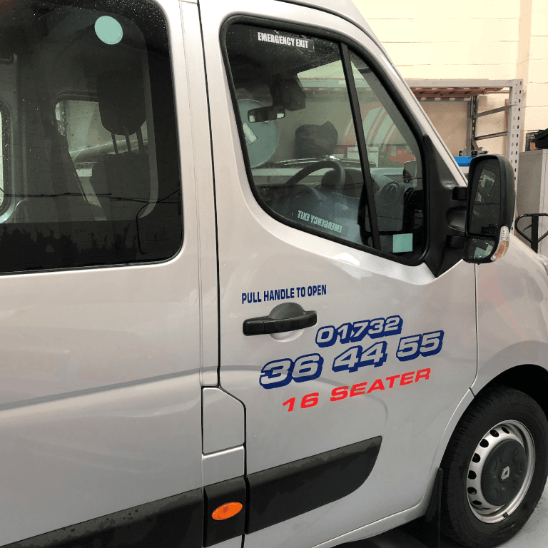 driver door and side view of Twice Recall Ltd minibus