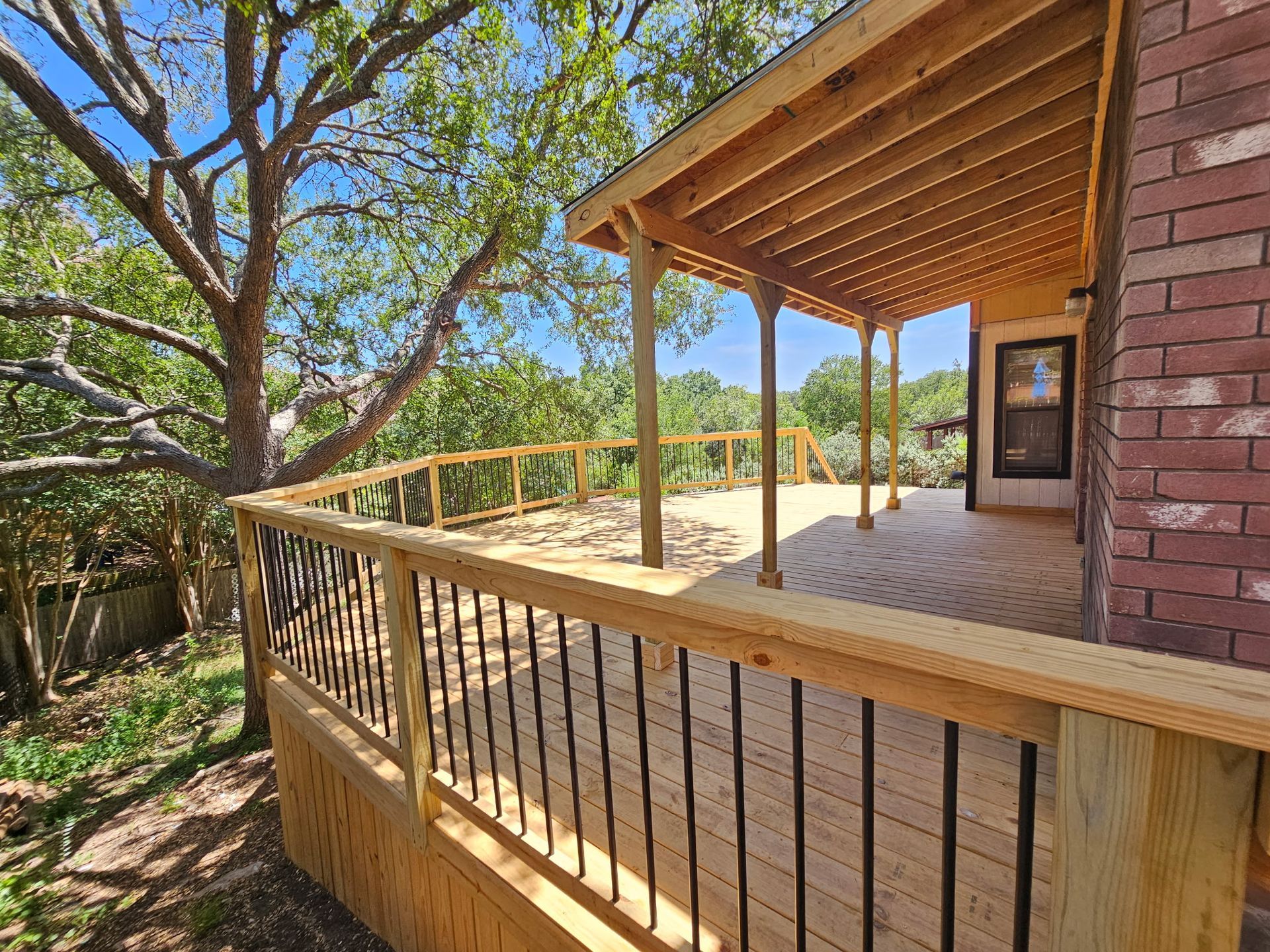 Covered deck and railing built by iBuild San Antonio in San Antonio TX