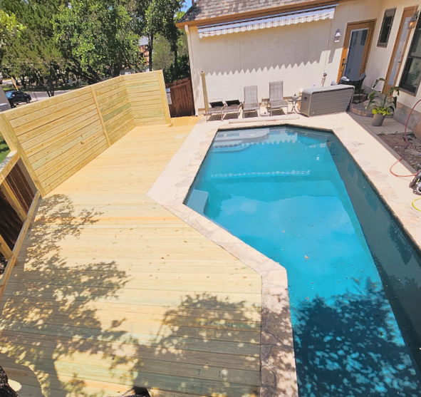 new pool deck and privacy fencing for texas weather