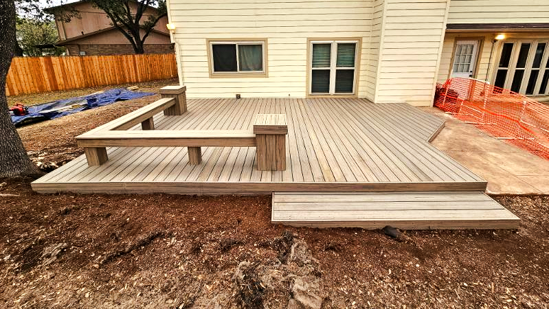 Low-profile backyard deck built behind a home in the San Antonio area