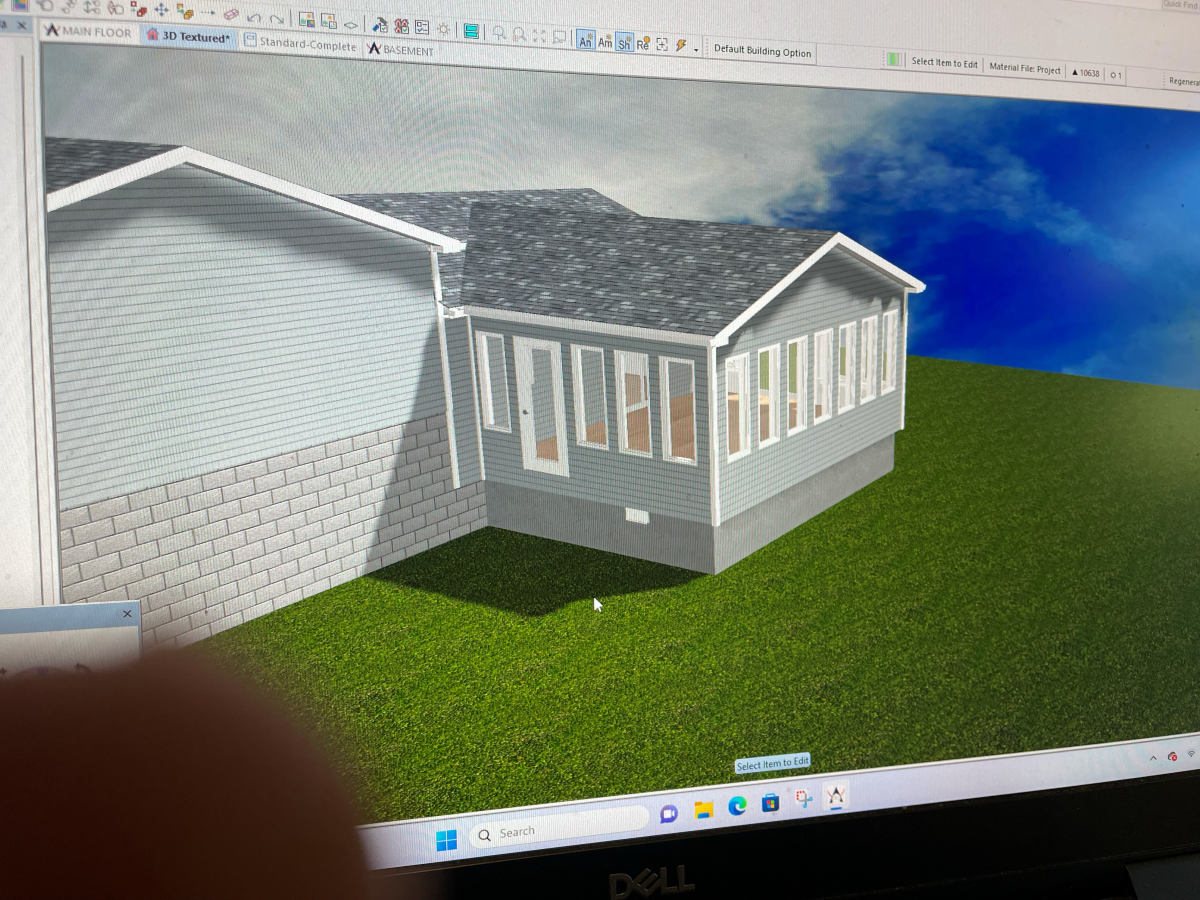 3D rendering of a house addition with multiple windows, grey siding, and a green lawn under a blue sky.