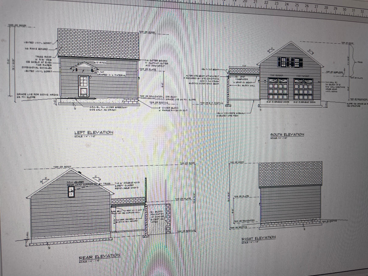 Architectural drawings showing the side and front elevations of a two-story building with a garage.