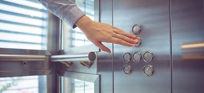 Elevator Maintenance — Pushing Button in Elevator in Harlingen, TX