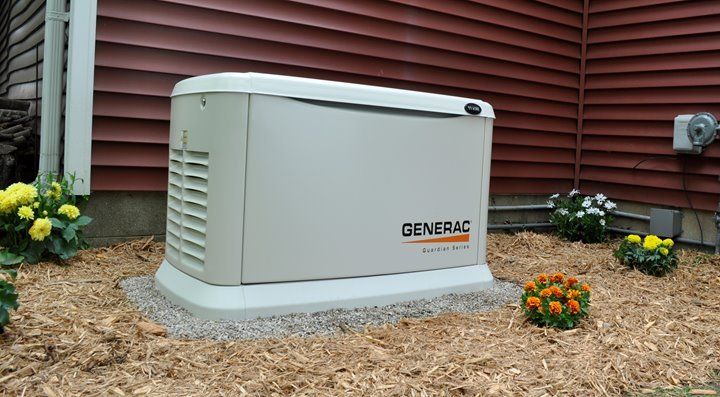 A generator installation in the backyard of a house.