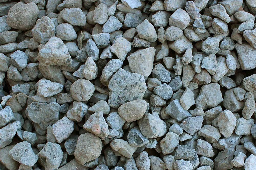 A Pile of Gravel is Sitting on Top of Each Other — Caloundra Landscape Supplies in Warana, QLD