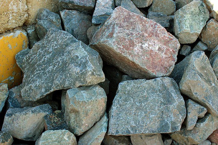 A Pile of Rocks is Sitting on Top of Each Other on a Table — Caloundra Landscape Supplies in Beerwah, QLD
