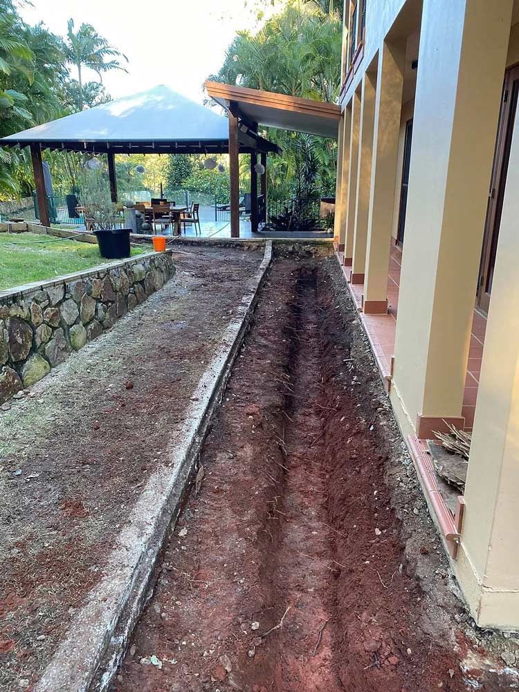A Dirt Path Leading to a House With a Gazebo in the Background — Caloundra Landscape Supplies in Caloundra, QLD