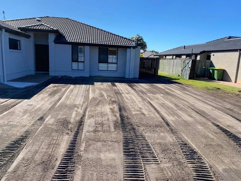 A House With a Lot of Dirt in Front of It — Caloundra Landscape Supplies in Caloundra, QLD