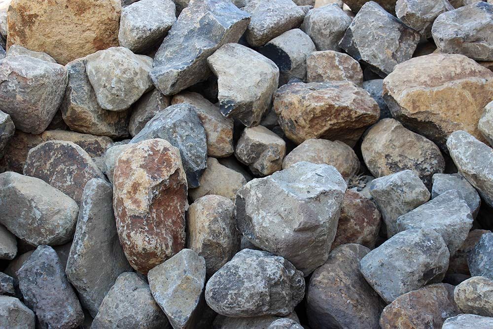 A Pile of Rocks Sitting on Top of Each Other — Caloundra Landscape Supplies in Caloundra, QLD