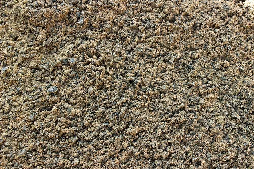 A Pile of Gravel is Sitting on Top of a Pile of Dirt — Caloundra Landscape Supplies in Caloundra, QLD