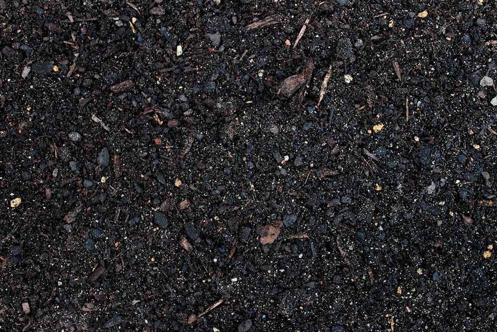 A Pile of Black Dirt With a Lot of Small Rocks in It — Caloundra Landscape Supplies in Beerwah, QLD