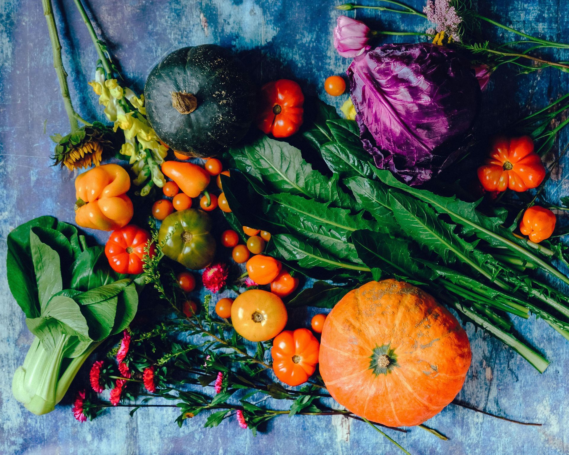 A Bunch of Fruits and Vegetables on a Blue Surface — Caloundra Landscape Supplies in Caloundra, QLD
