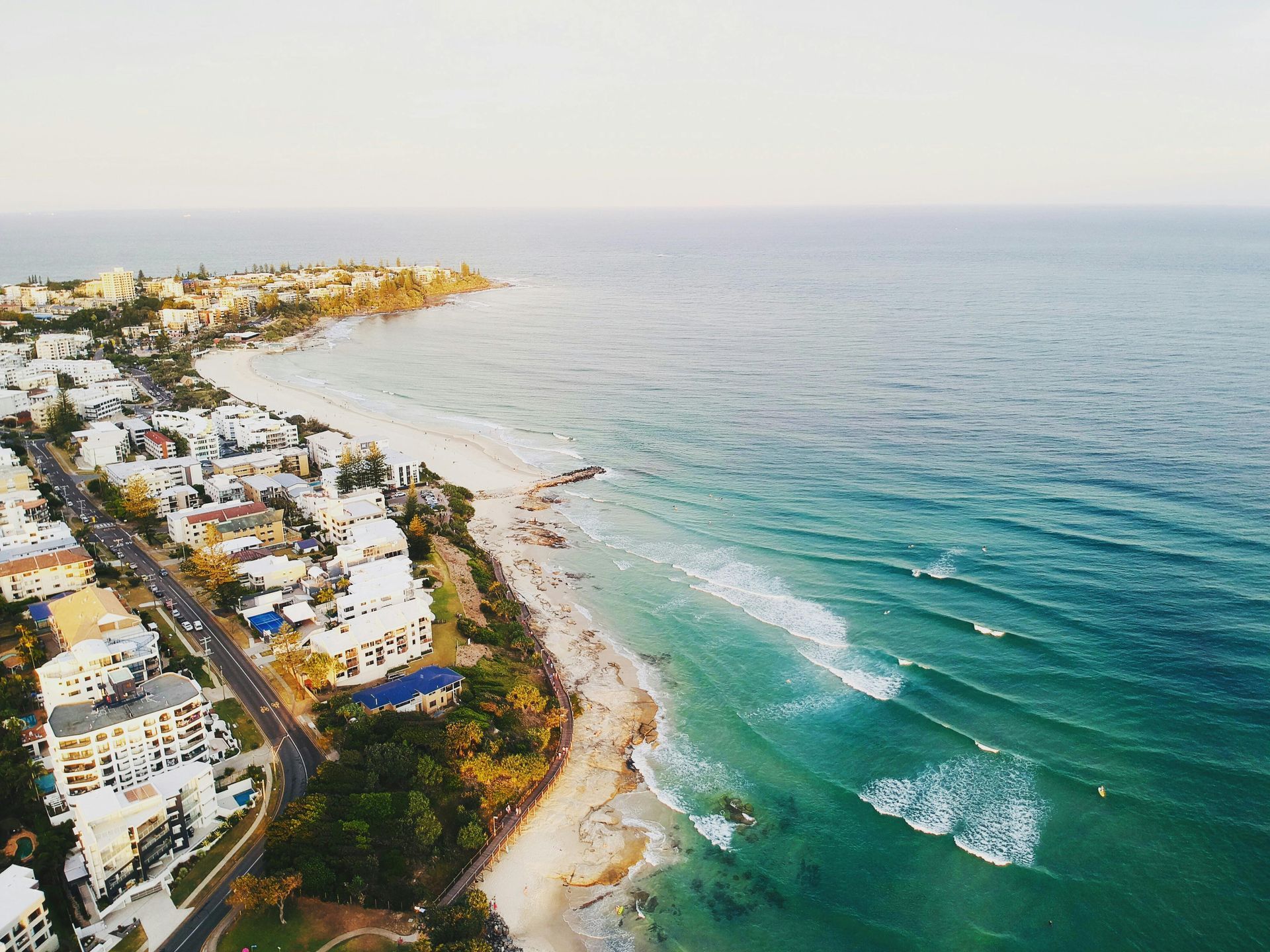 An Aerial View of a Body of Water With a City in the Background — Caloundra Landscape Supplies in Caloundra, QLD